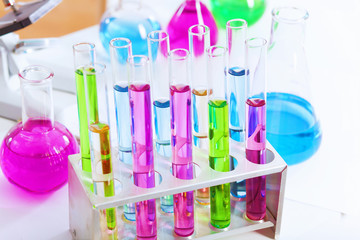 Chemistry laboratory glassware with colour liquids