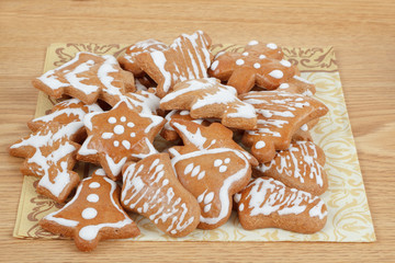 christmas gingerbreads on wooden table