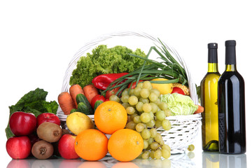 Composition with vegetables and fruits in wicker basket