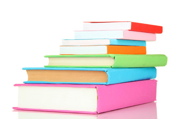 Stack of multicolor books  isolated on white