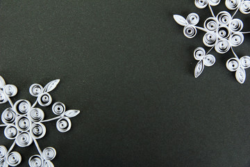 beautiful paper snowflakes, on black background