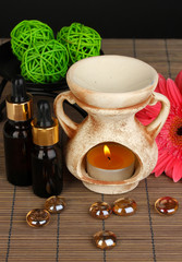 Aromatherapy lamp on grey background