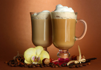 Fragrant coffee latte in glasses cups with spices,