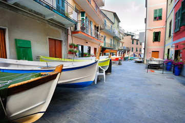 Street with fishing boats in an Italian village Manarola