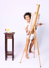young smiling curly woman painter boyfriends shirt dressed