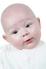 Portrait of  baby girl with blue eyes isolated