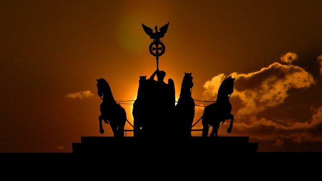Germany The Brandenburg Gate sculpture sungliding