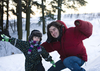 young father with son outdoor in winter landscape, lifestyle people