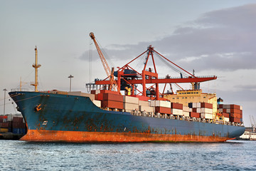 Fototapeta premium Cargo container ship in seaport