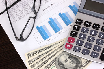 Documents, money and glasses close-up
