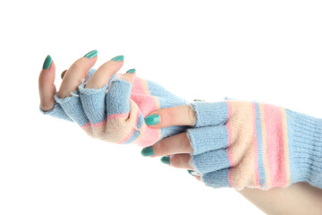 woman knitted gloves on hands, isolated on white
