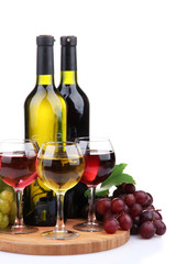 Fototapeta premium bottles and glasses of wine and assortment of grapes, isolated
