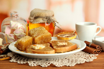 White bread toast with honey and cup of coffee in cafe