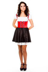 young and beautiful woman in a traditional Bavarian dress
