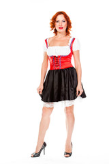 young and beautiful woman in a traditional Bavarian dress
