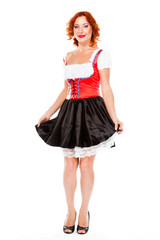 young and beautiful woman in a traditional Bavarian dress