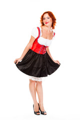 young and beautiful woman in a traditional Bavarian dress