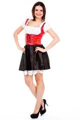 young and beautiful woman in a traditional Bavarian dress