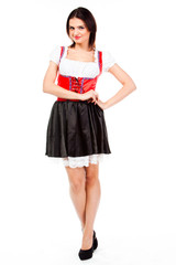 young and beautiful woman in a traditional Bavarian dress