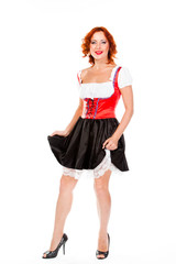 young and beautiful woman in a traditional Bavarian dress