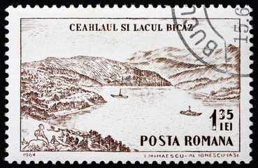 Obraz premium Postage stamp Romania 1964 Ceahlaul Peak and Lake Bicaz