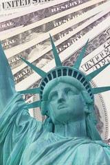 Statue of Liberty and Dollars background