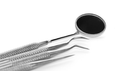 Basic dentist tools isolated on white