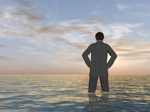 Conceptual Young businessman standing in water