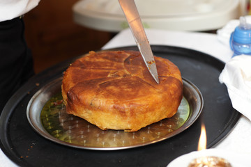 Cook cutting Khan Pilaf