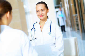 Portrait of two friendly female doctors