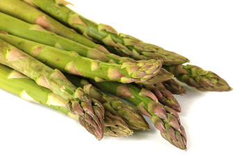 Fresh asparagus isolated on white.