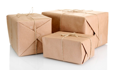 parcels boxes with kraft paper, isolated on white