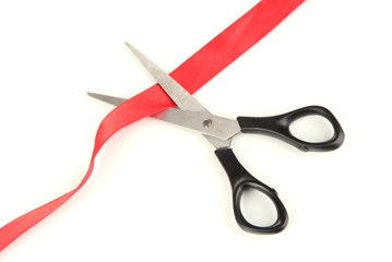 Cutting red ribbon isolated on white