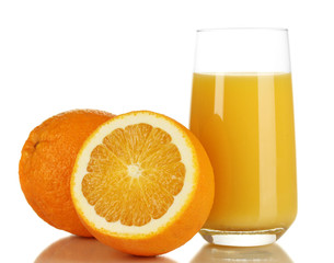 Delicious orange juice in glass and oranges next to it isolated