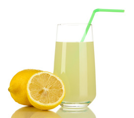 Delicious lemon juice in glass and lemons next to it isolated