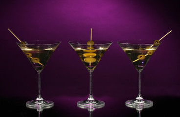 Martini glasses on dark background