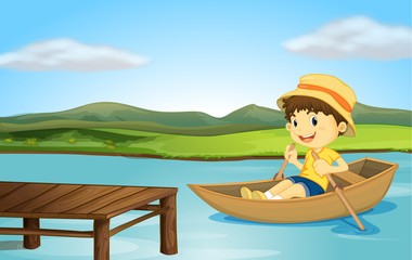 Un garçon dans un bateau et un banc en bois