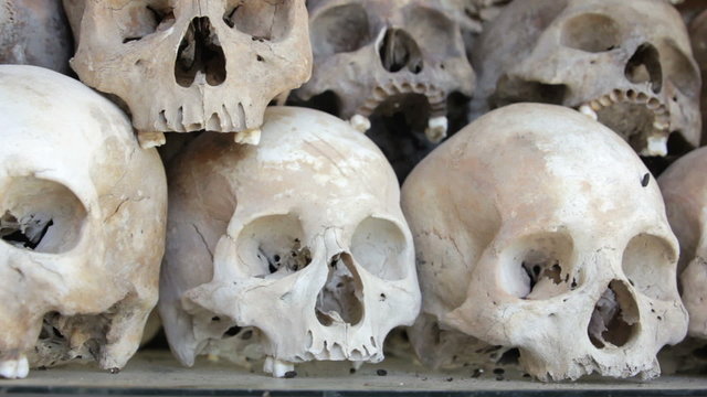 Skulls and bones in Killing field, cambodia, moving camera