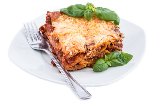 Lasagne on a plate (white background)
