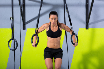 Crossfit dip ring woman workout at gym dipping