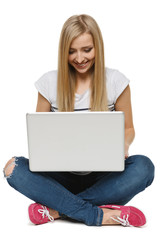 Naklejka premium Woman student sitting with laptop