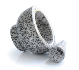 Fototapeta premium Stone mortar and pestle on white background