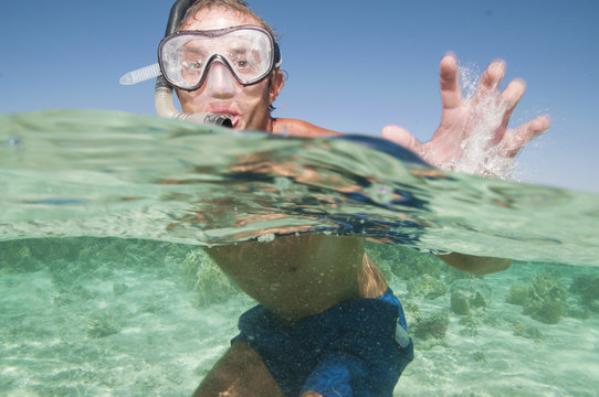 Man With Snorkel Mask And Finns