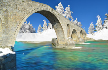 winter traditional bridge arta greece stone