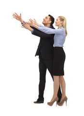 man and woman making a greeting gesture