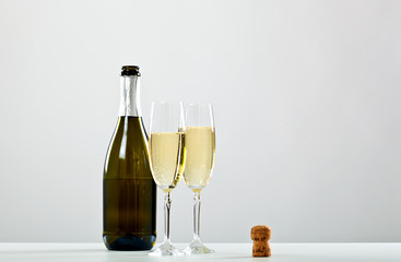 Bottle of champagne and two glasses © Minerva Studio