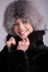 Beautiful woman in a fur hat