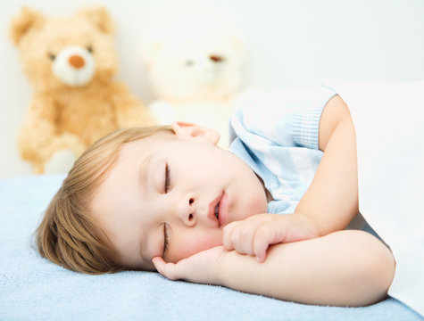 Cute little boy is sleeping