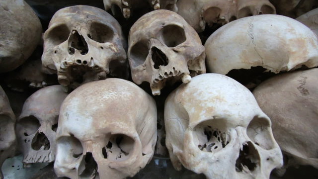 Skulls and bones in Killing field, cambodia, moving camera