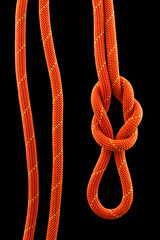 Fototapeta premium rope knot isolated on black background